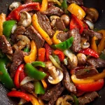 Deze stoof met paprika, rundreepjes en champignons is perfect voor drukke avonden en supersnel klaar