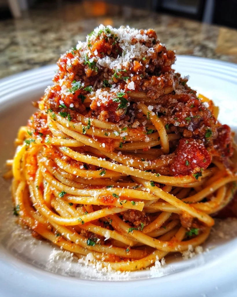 Als je spaghetti, gehakt en één geheim ingrediënt hebt… ontdek nu het perfecte recept!