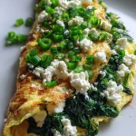 Omelet met spinazie, lente-ui en geitenkaas